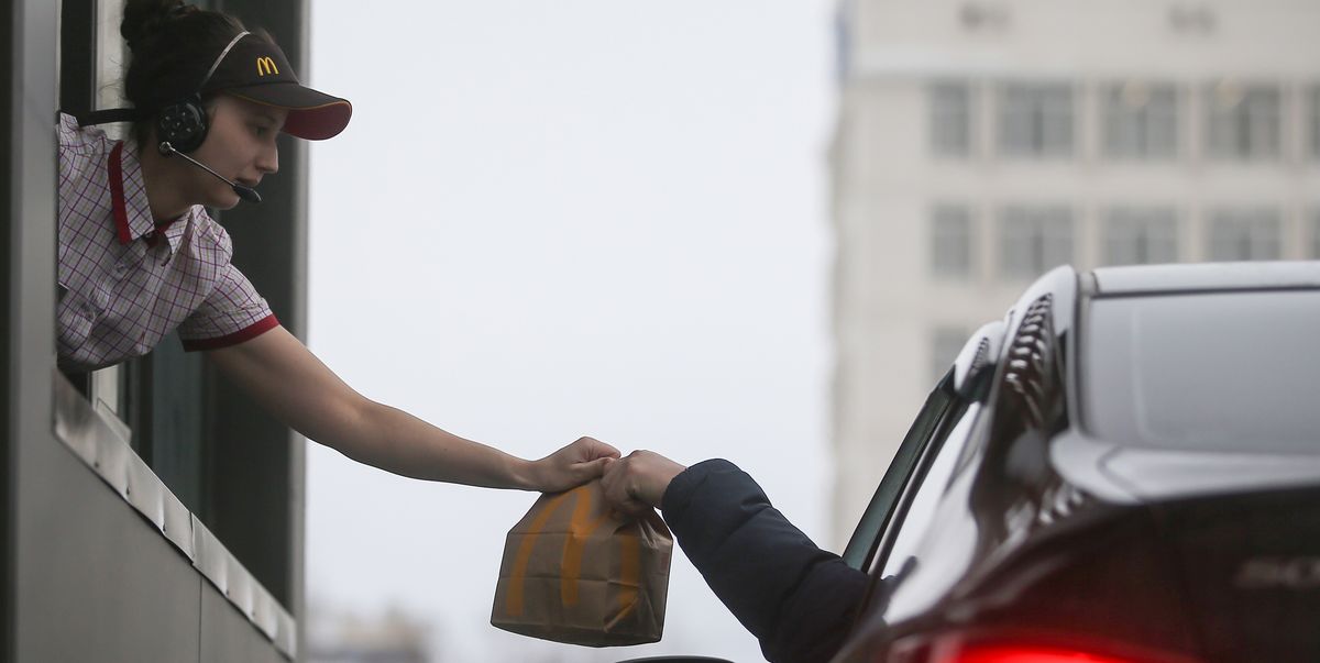 worker-at-a-mcdonalds-drive-through-in-kazan-tatarstan-news-photo-1577381620