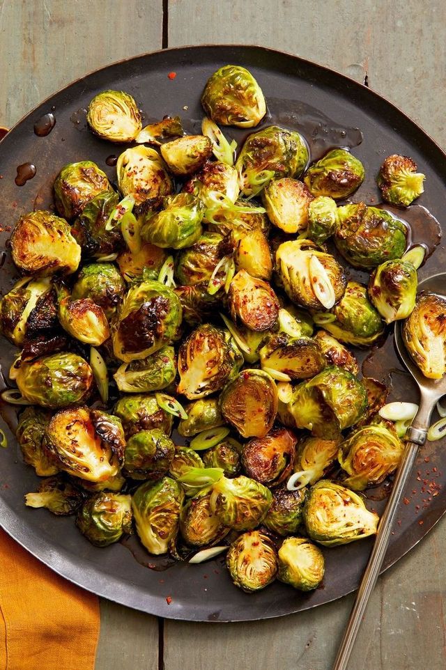 a serving plate with air fried brussels sprout for thanksgiving