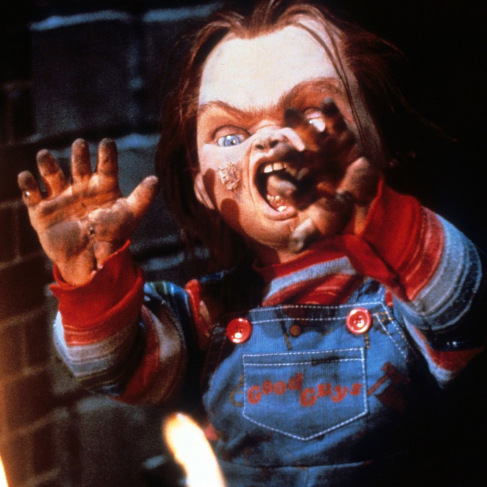 chucky attacks in a scene from child's play a good housekeeping pick for best halloween movies