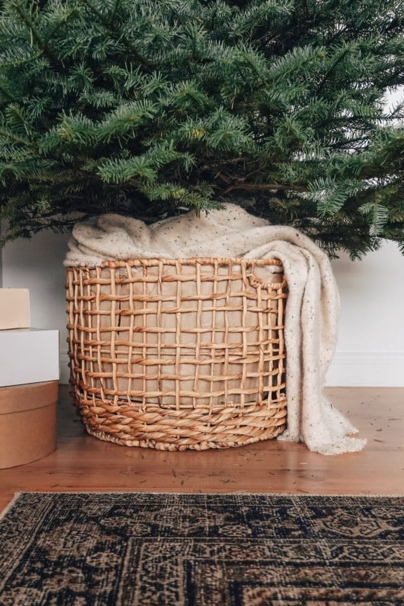 styling a christmas tree in a basket