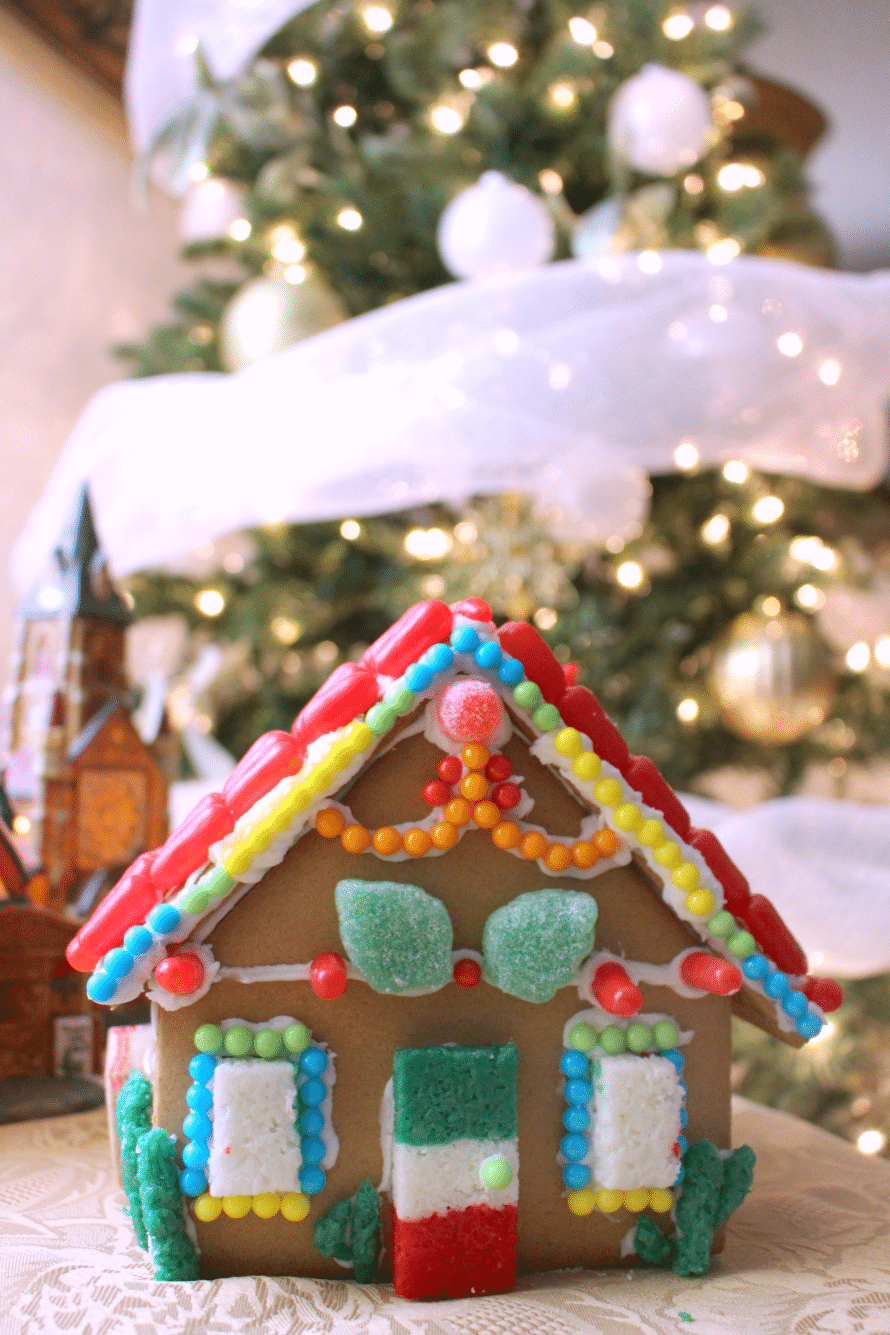 a homemade gingerbread house covered in candy