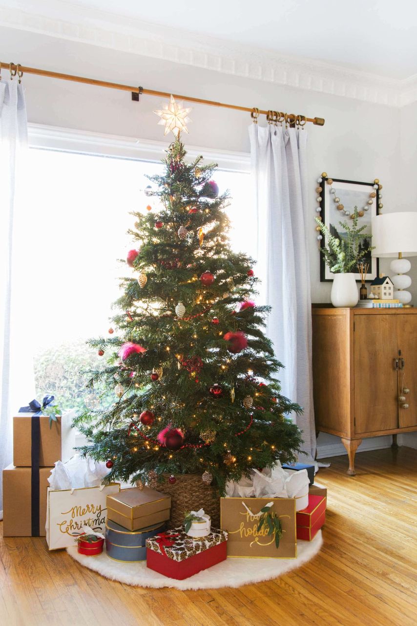 christmas tree with basket and skirt