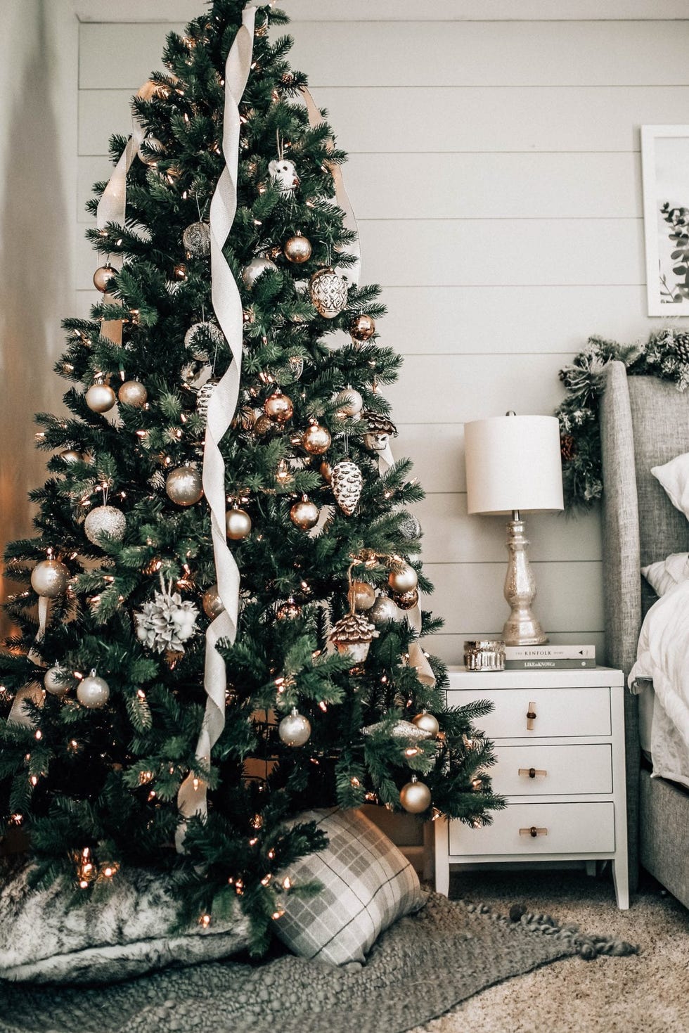 a tree with ornaments and lights