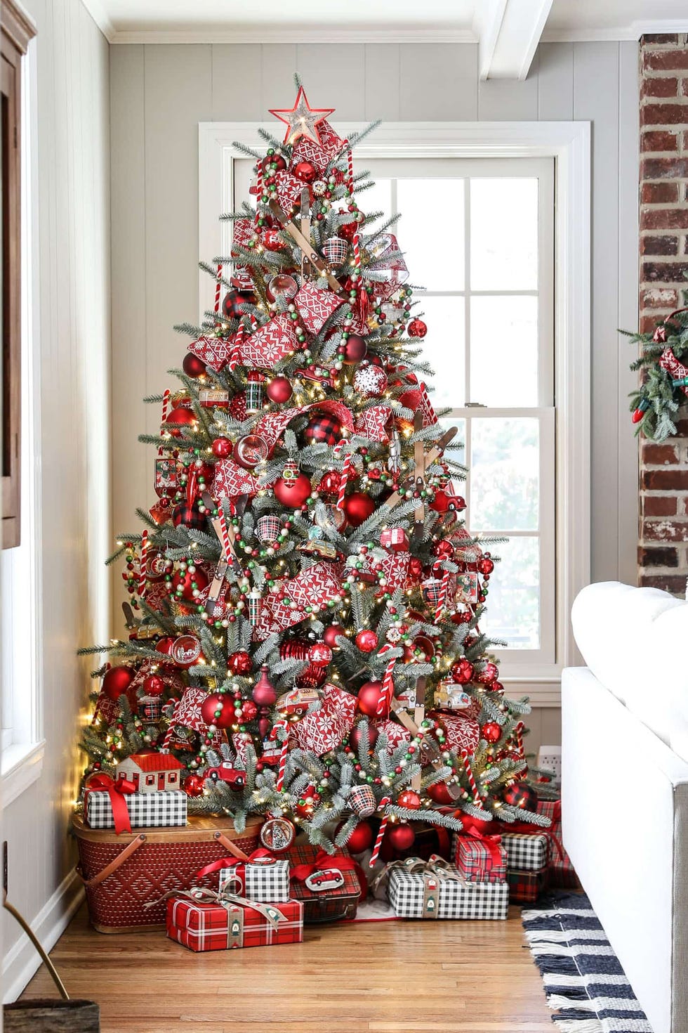 cozy lodge christmas tree with reds and golds