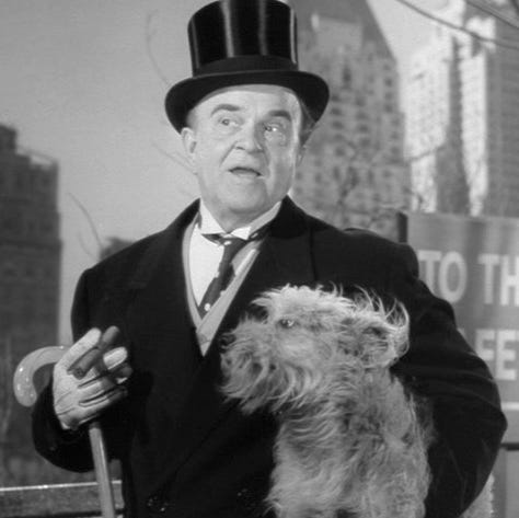 a hobo dresses in a top hat and carries a small dog to seem like a millionaire in a sene from it happened on fifth avenue