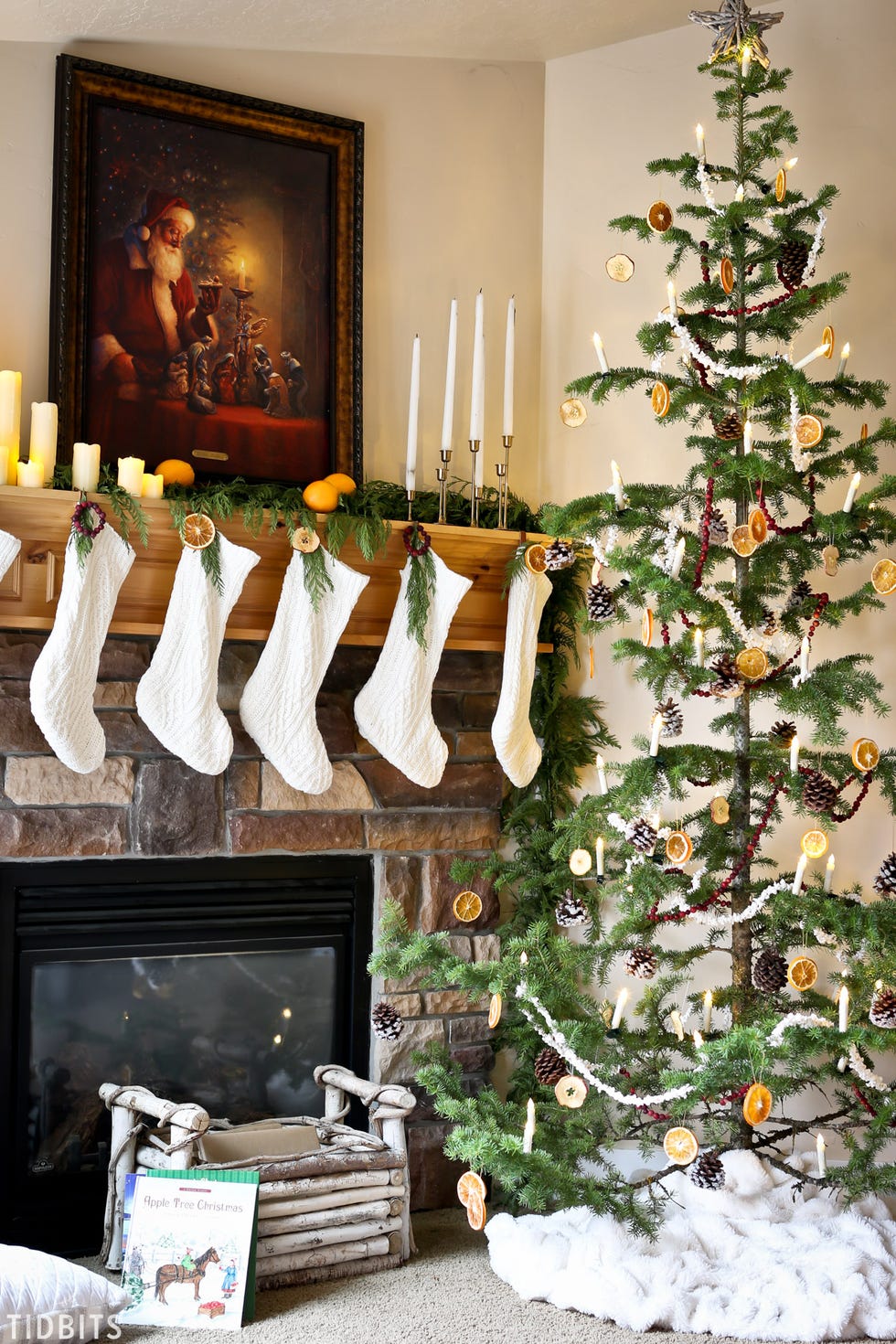 a christmas tree with candles and decorations