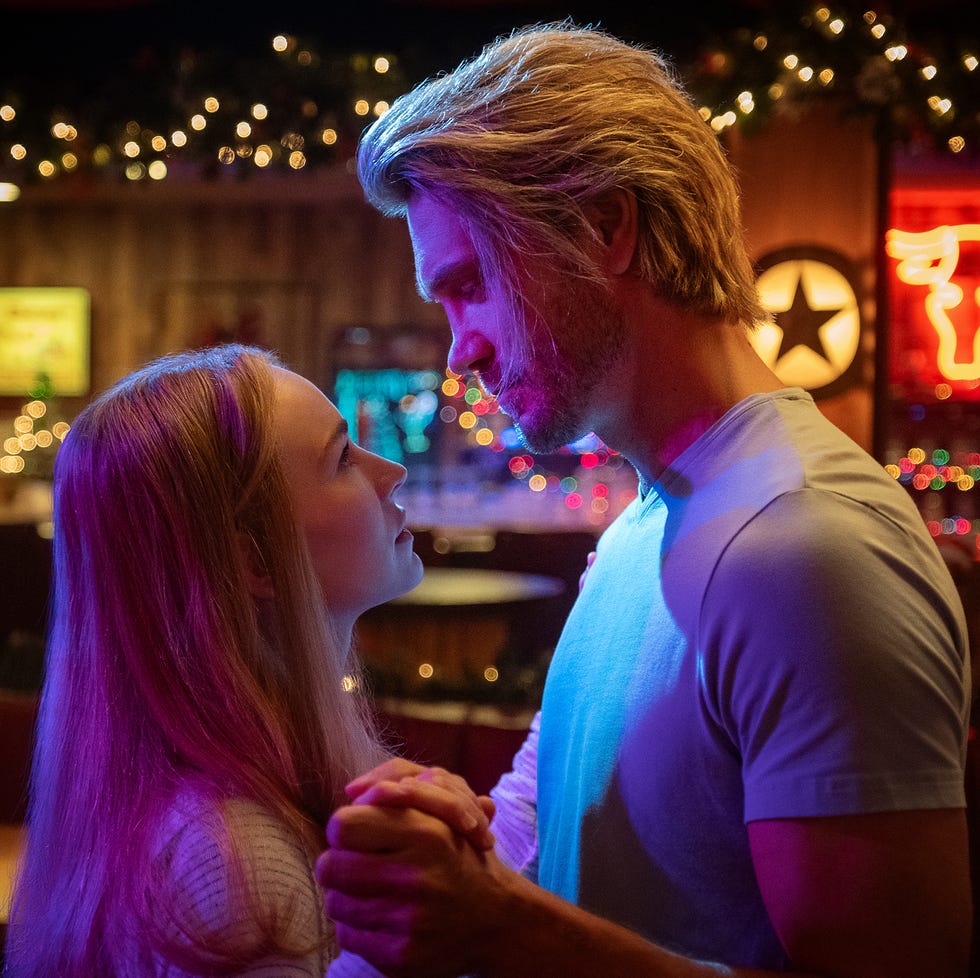 britt robertson as ashley and chad michael murray as luke share a dance in the merry gentlemen