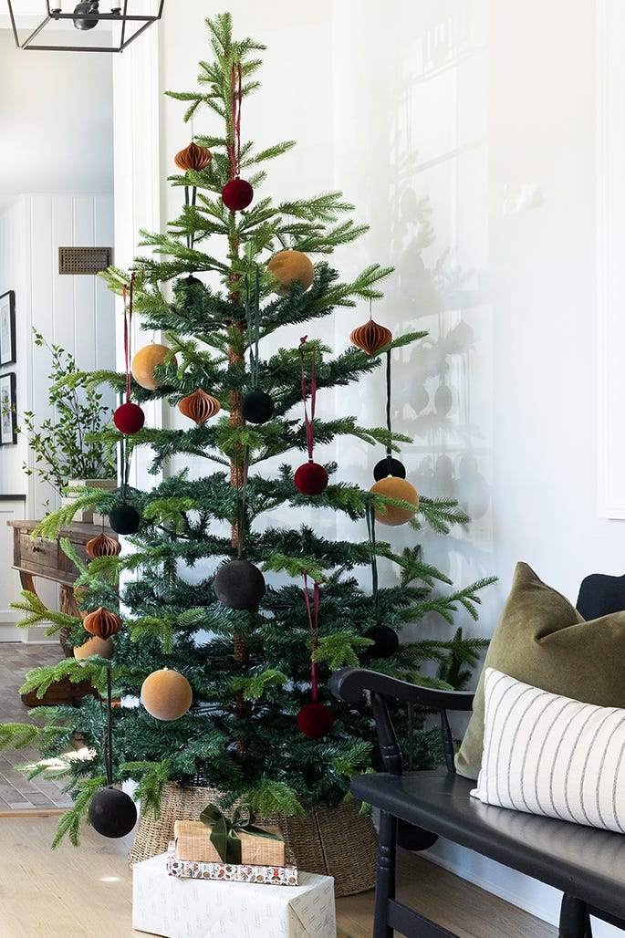 a living room with a christmas tree