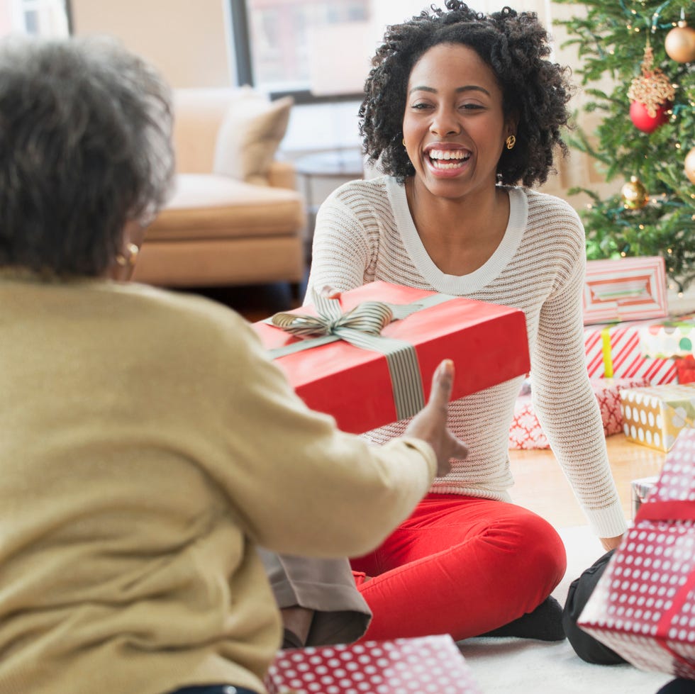 family opening christmas presents together