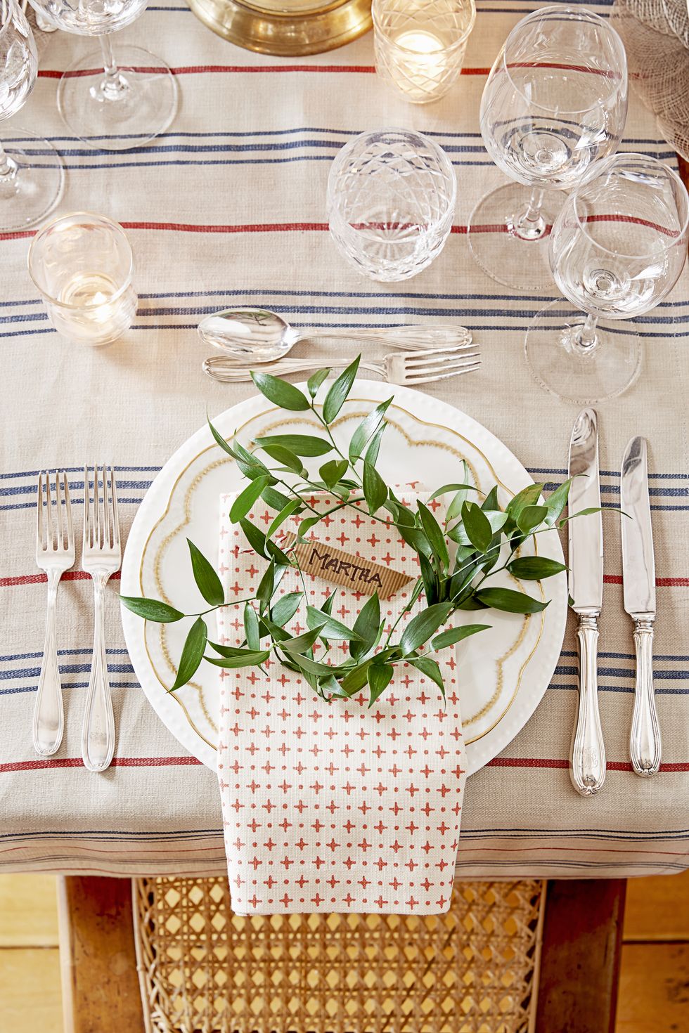 rustic christmas table place setting with faux greens