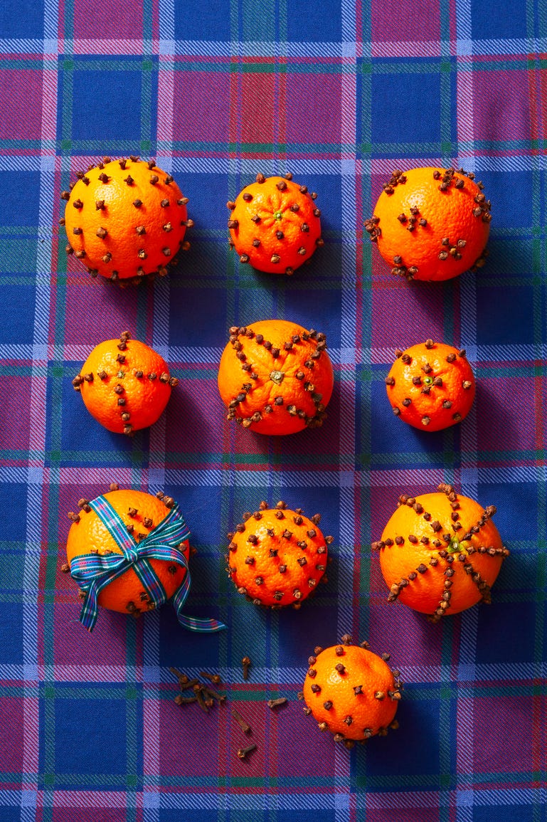 orange decor on plaid tablecloth