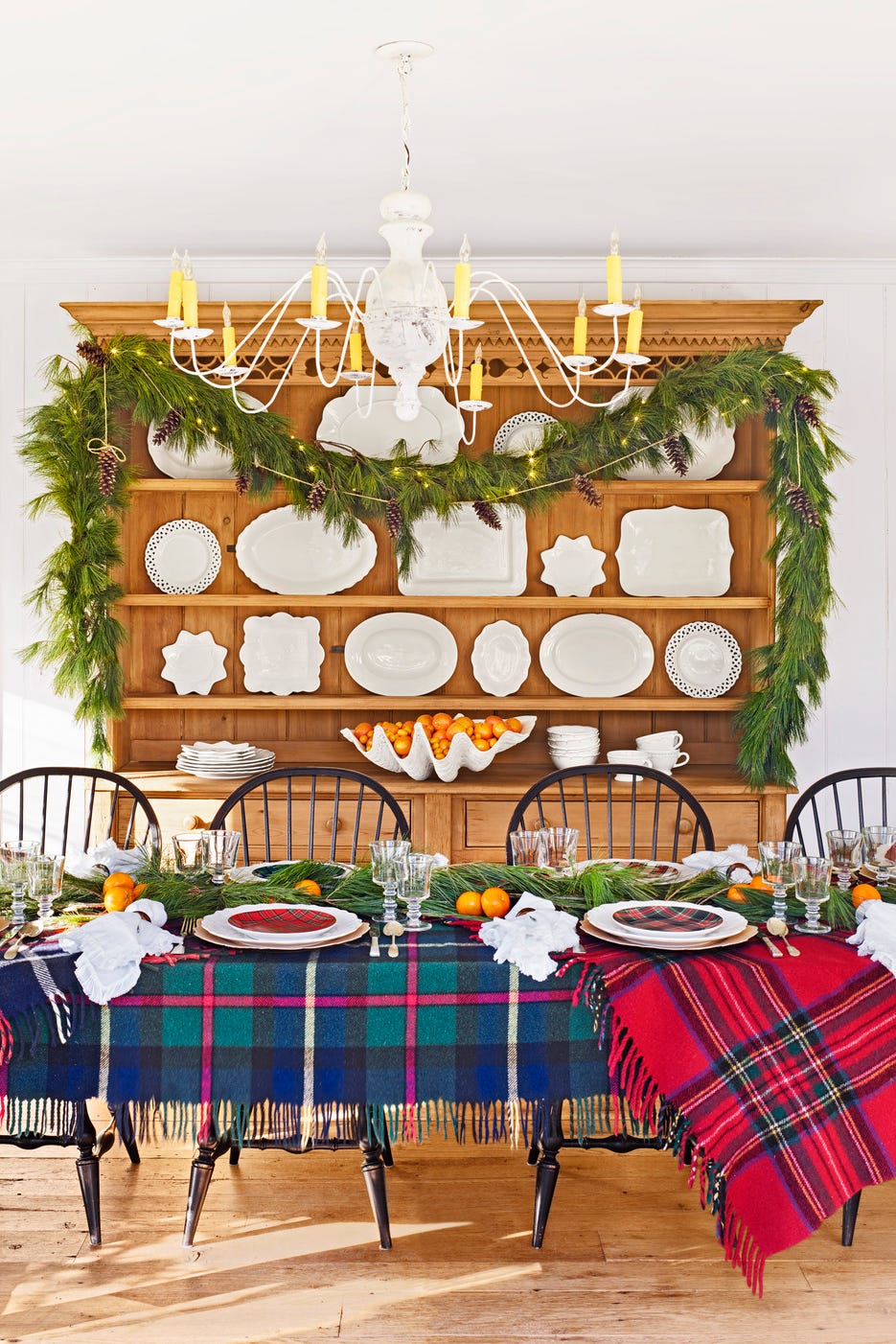 dining room with holiday decorations and plaid tableclothes