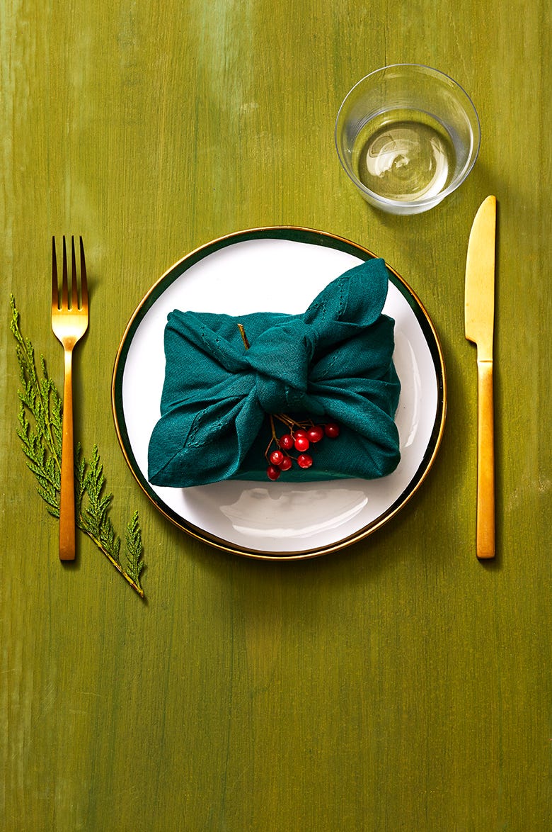 green with red berries table setting ideas