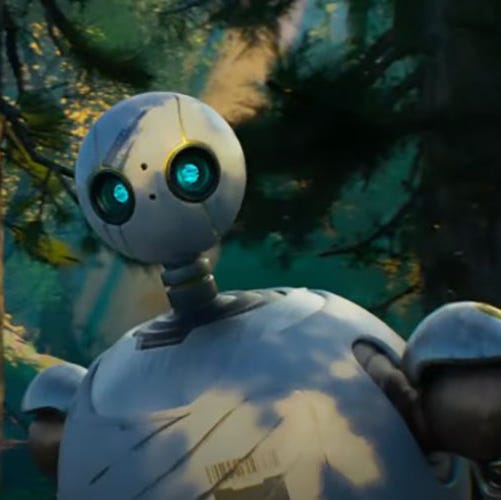 a robot explores the woods in a scene from the wild robot, a good housekeeping pick for best movies for kids 2024