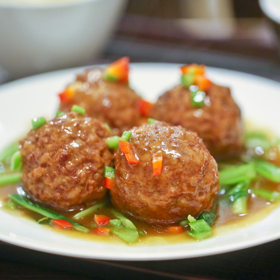 sixi balls, also known as lions head meatballs w vegetable garnish served at lunchtime in yokohama