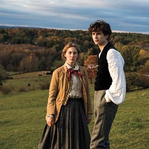 jo and laurie stand on a hill in a scene from little women, a good housekeeping pick for best valentines day movies for kids